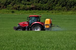 Why Farmers Choose Red Case IH Tractors With Sprayers For Modern Agriculture